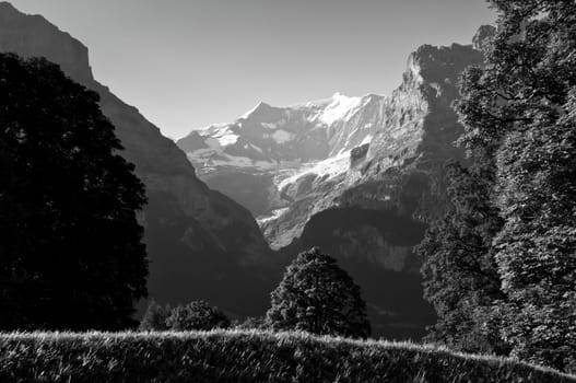 Swiss Alps - snow capped mountains and deep valleys, stunning view, breath-taking panorama