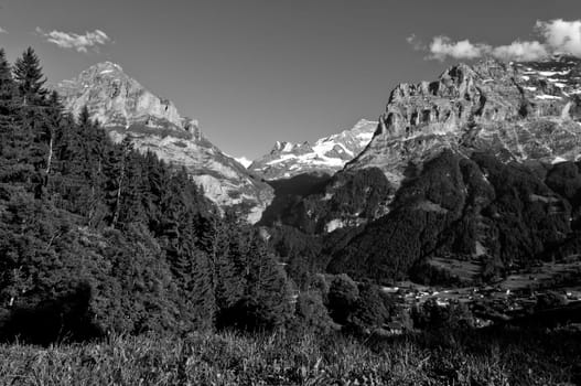 Swiss Alps - snow capped mountains and deep valleys, stunning view, breath-taking panorama