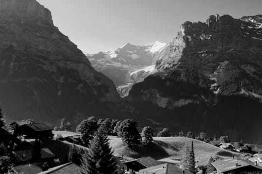 Swiss Alps - snow capped mountains and deep valleys, stunning view, breath-taking panorama