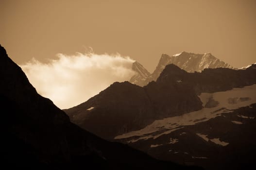 Swiss Alps - snow capped mountains and deep valleys, stunning view, breath-taking panorama