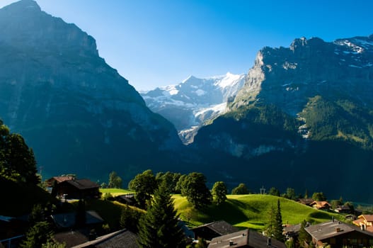 Swiss Alps - snow capped mountains and deep valleys, stunning view, breath-taking panorama