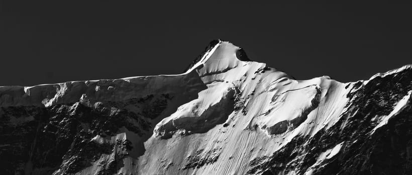 Swiss Alps - snow capped mountains and deep valleys, stunning view, breath-taking panorama