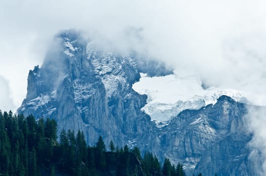 Swiss Alps - snow capped mountains and deep valleys, stunning view, breath-taking panorama