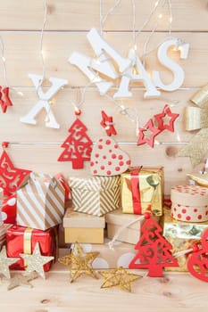 Small gifts for Christmas on rustic wood