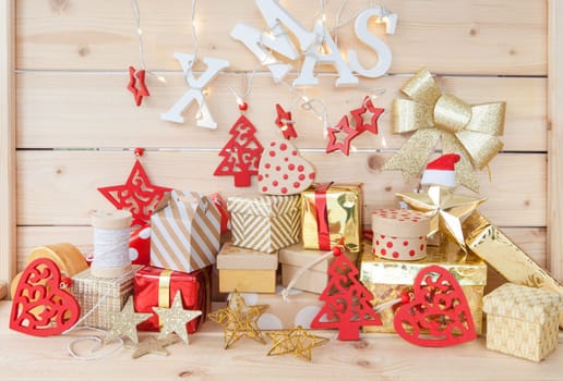 Small gifts for Christmas on rustic wood