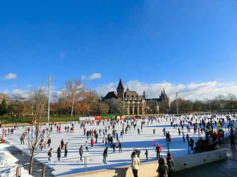 Budapest, Hungary - January, 04,2015: Ice skaters in City Park Ice Rink in Budapest, Hungary. Opened in 1870, it is the largest and one of the oldest ice rinks in Europe.