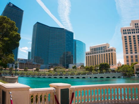 Las Vegas, United States of America - May 05, 2016: Hotel Cosmopolitan and people walking on The Strip, the world famous Las Vegas Boulevard South, mostly known for its concentration of resort hotels and casinos along the street route.