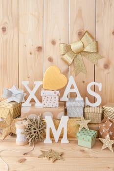 Small gifts for Christmas on rustic wood