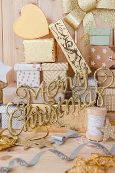 Small gifts for Christmas on rustic wood
