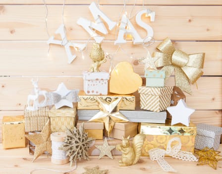 Small gifts for Christmas on rustic wood
