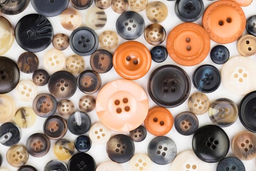 Button texture with orange and black tones.
