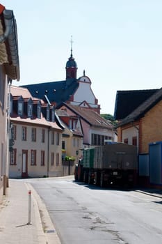 The main road of the district Marienborn in Mainz with the Sankt Stephan Church in the background.