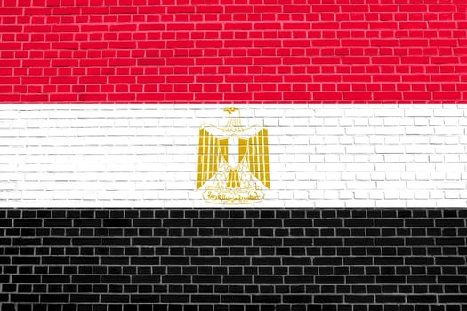 Egyptian national official flag. Arab Republic of Egypt patriotic symbol, banner, element, background. Flag of Egypt on brick wall texture background