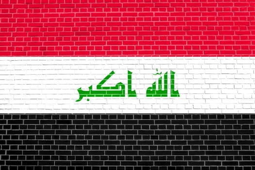 Iraqi national official flag. Irak patriotic symbol, element, background. Iraki banner. Flag of Iraq on brick wall texture background