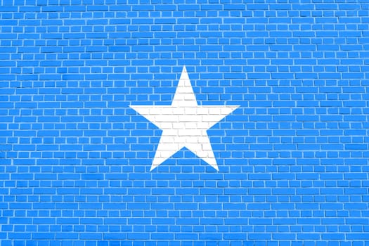 Somali national official flag. African patriotic symbol, banner, element, background. Flag of Somalia on brick wall texture background