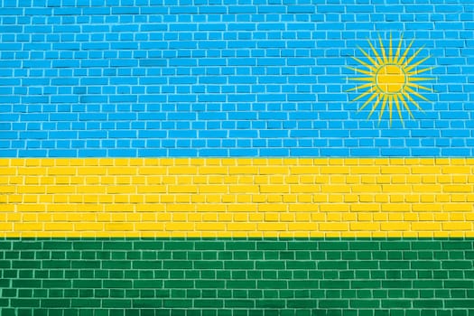 Rwandan national official flag. African patriotic symbol, banner, element, background. Flag of Rwanda on brick wall texture background