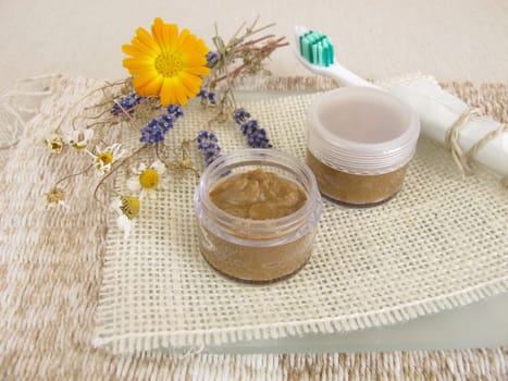 Homemade toothpaste from coconut oil,healing earth powder and baking soda