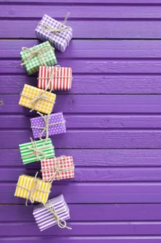Small gifts for Christmas on rustic wood