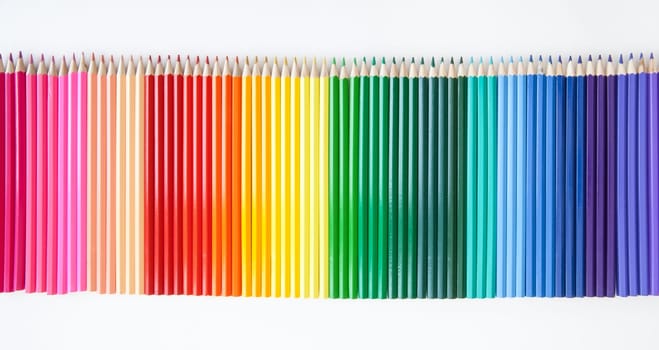 Many colorful pens arranged in series with text space