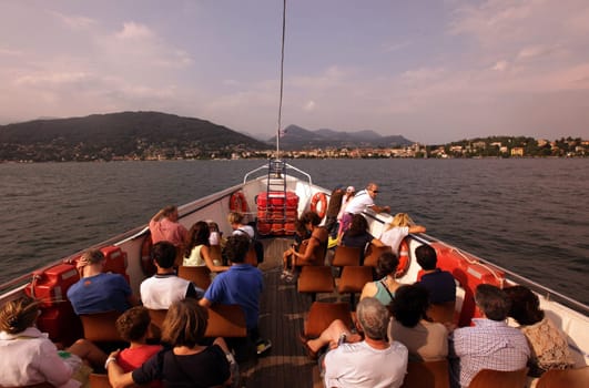 The Tourist Boat near the old town of Pallanza near to Verbania on the Lago maggiore in the Lombardia in north Italy.