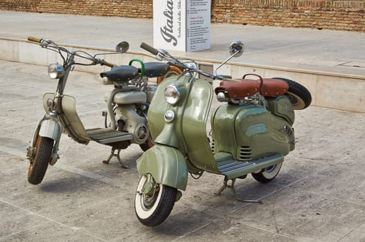 Senigalia, ITALY - July 13 Old scooter parked on the square in city Senigalia on July 13, 2013, Italy.