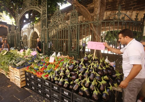 the fegetable and food market in the old town of Catania in Sicily in south Italy in Europe.