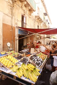 the fruit and fegetable market in the old town of Siracusa in Sicily in south Italy in Europe.