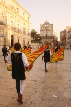 a history ceremony in the old town of Siracusa in Sicily in south Italy in Europe.