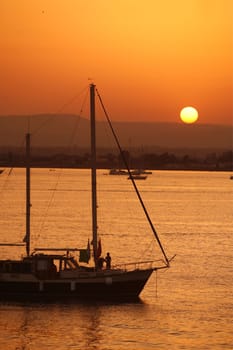 a Sunset at the old town of Siracusa in Sicily in south Italy in Europe.