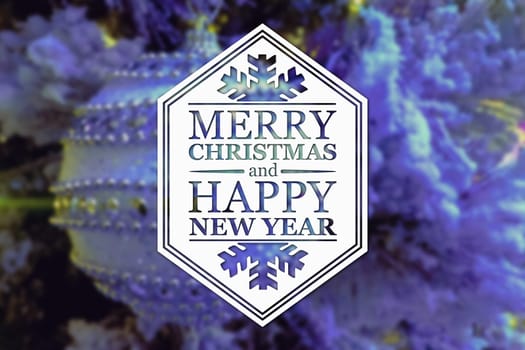 Merry Christmas and New Year greeting card on blurred festive decoration ball or toy and spruce violet or purple colored background