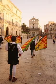 a history ceremony in the old town of Siracusa in Sicily in south Italy in Europe.
