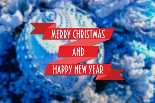 Merry Christmas and New Year greeting card on blurred festive decoration ball or toy and spruce blue colored background