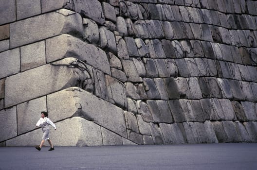 The stonewall at the Imperial Palace of Tokyo in Japan in Asia,....