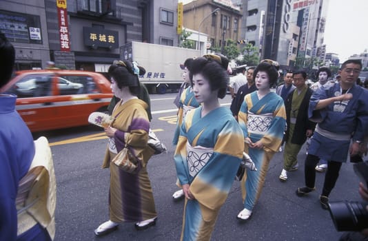 a Gaisha at the big Edo Festival at the Kanda-Matsuri Temple in the City center of Tokyo in Japan in Asia,....