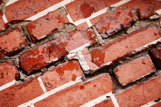 texture of red brick wall photographed close up