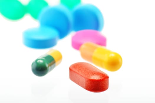 Composition with variety of drug pills and container