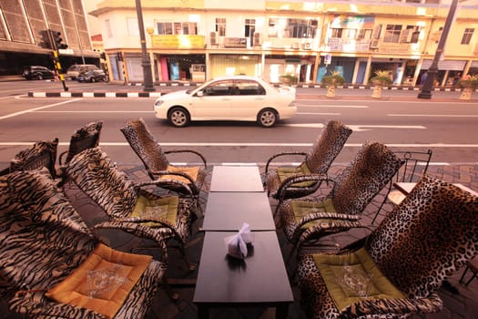 a chair in tiger style in a restaurant in the city of Bandar seri Begawan in the country of Brunei Darussalam on Borneo in Southeastasia.
