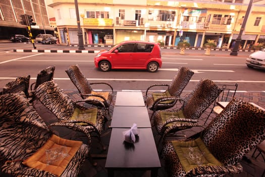 a chair in tiger style in a restaurant in the city of Bandar seri Begawan in the country of Brunei Darussalam on Borneo in Southeastasia.