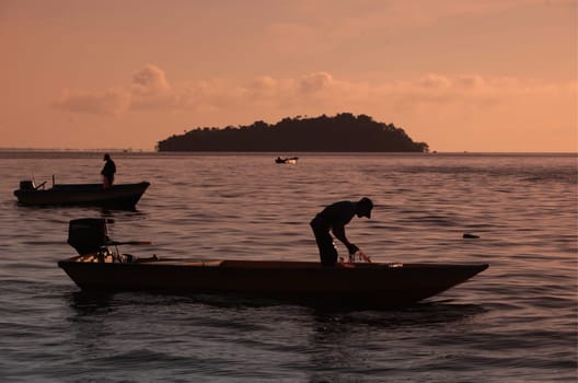a fishermen on the coast near the city of Bandar seri Begawan in the country of Brunei Darussalam on Borneo in Southeastasia.