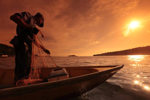 a fishermen on the coast near the city of Bandar seri Begawan in the country of Brunei Darussalam on Borneo in Southeastasia.
