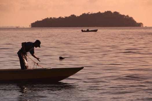 a fishermen on the coast near the city of Bandar seri Begawan in the country of Brunei Darussalam on Borneo in Southeastasia.