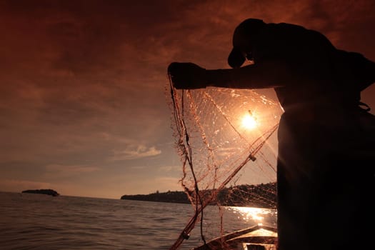 a fishermen on the coast near the city of Bandar seri Begawan in the country of Brunei Darussalam on Borneo in Southeastasia.