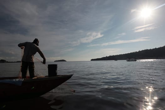 a fishermen on the coast near the city of Bandar seri Begawan in the country of Brunei Darussalam on Borneo in Southeastasia.