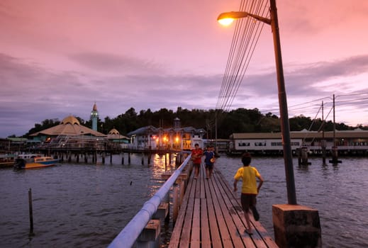the water village and town of Kampung Ayer in the city of Bandar seri Begawan in the country of Brunei Darussalam on Borneo in Southeastasia.
