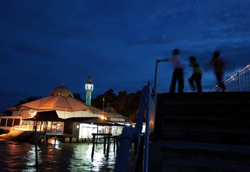 the water village and town of Kampung Ayer in the city of Bandar seri Begawan in the country of Brunei Darussalam on Borneo in Southeastasia.