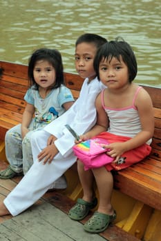 Childern in the city centre in the city of Bandar seri Begawan in the country of Brunei Darussalam on Borneo in Southeastasia.