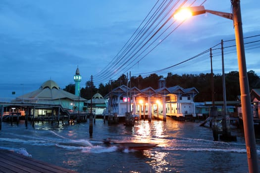 the water village and town of Kampung Ayer in the city of Bandar seri Begawan in the country of Brunei Darussalam on Borneo in Southeastasia.