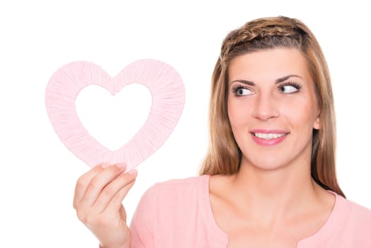 Portrait of a young woman with a pink heart against a white background