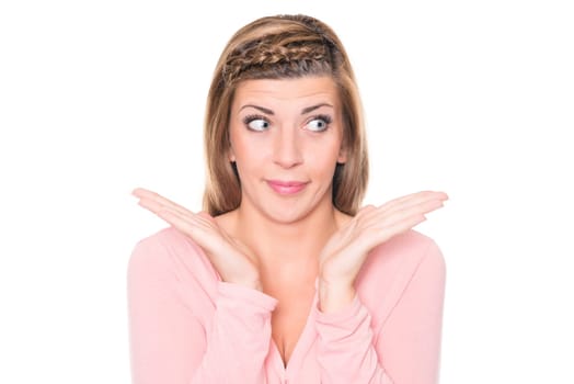 Astonished young woman against a white background
