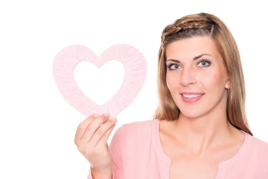 Portrait of a young woman with a pink heart against a white background